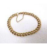 9ct Yellow Gold Double link 7 inch Bracelet with Safety Chain fitted, heart shaped catch.   Total we