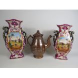 Victorian salt glaze teapot and a pair of vintage continental transfer printed vases, the tallest