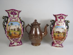 Victorian salt glaze teapot and a pair of vintage continental transfer printed vases, the tallest