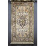 Decorative Rug with floral design.  Measures 69 x 35 inches. See photos.   S2