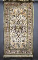 Decorative Rug with floral design. Measures 69 x 35 inches. See photos. S2