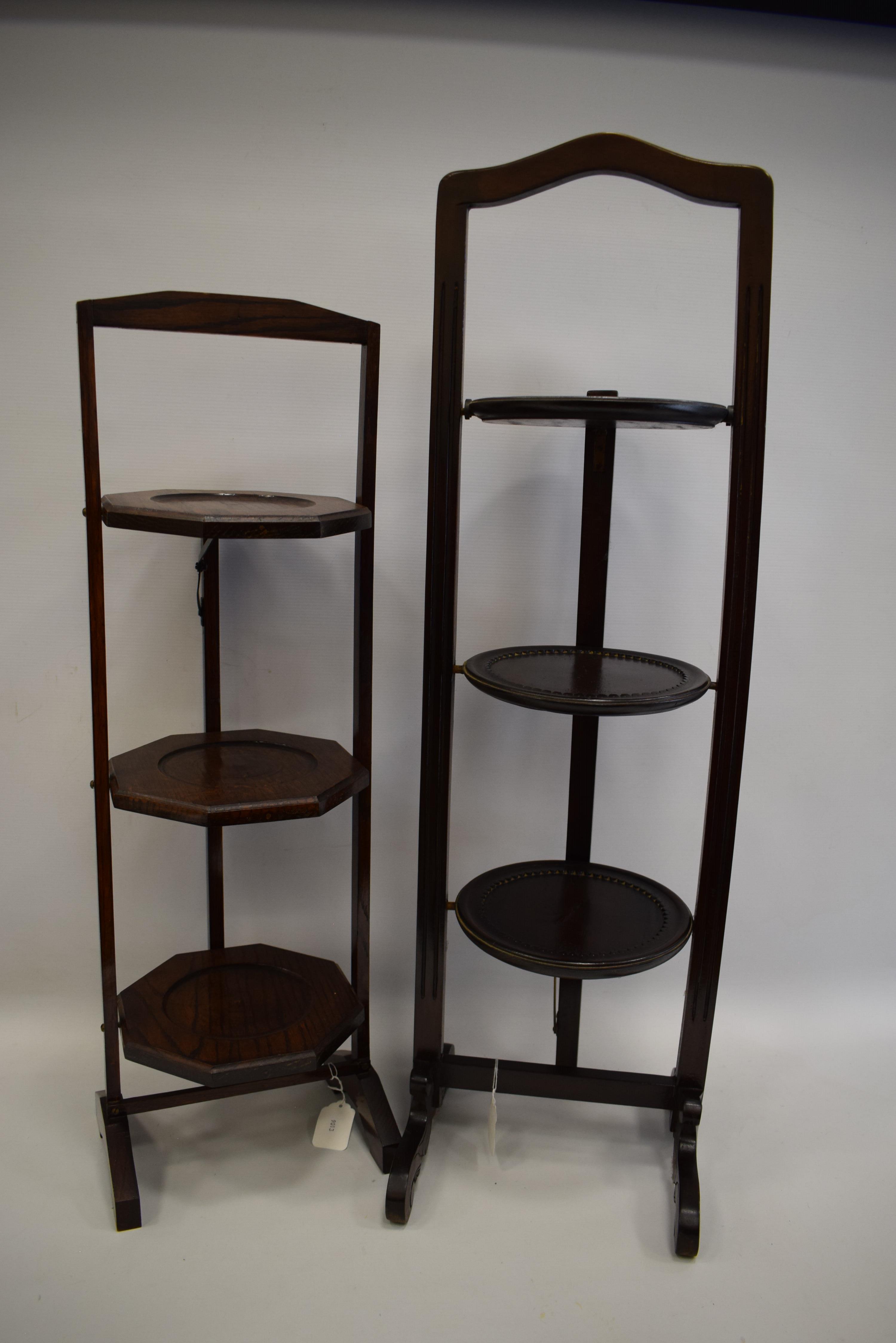 Two Early 20th Century folding wooden cake stands.  Approx 38 inches tall. See photos.  S2
