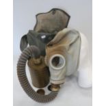 Vintage Gasmask with Canister and bag. (rubber has perished to top of gasmask) see photos.