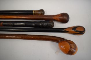 Five Interesting vintage walking sticks. See photos.