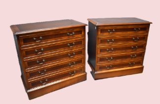 Pair of Reproduction Wellington style bedroom chests in cherry wood veneer, five drawers each measur