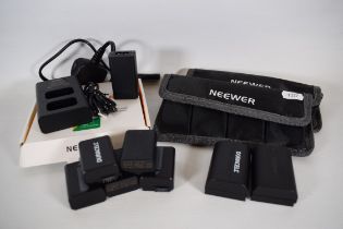 Batteries for Sony & Canon Cameras plus storage pouches. See photos for details.