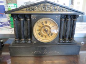 Lovely Slate bodied Mantle clock with Brass dial in excellent running order. Made by the Ansonia clo