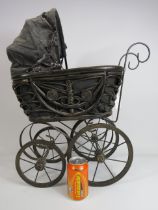 Model Pram in a victorian style, 25" tall and 20" long.