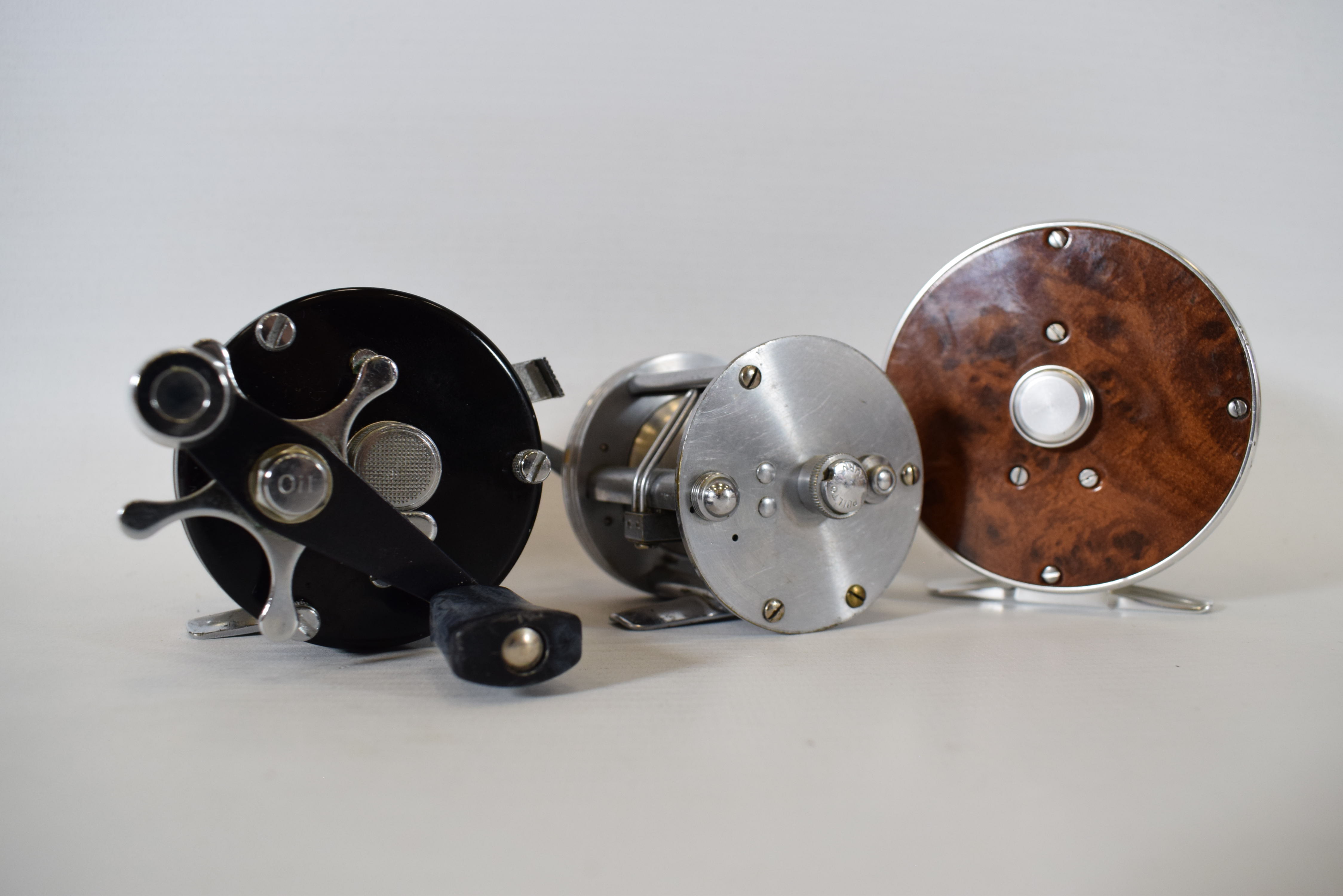 Two Small Spinning or Multiplier reels plus one fly reel.  See photos.  - Image 2 of 4