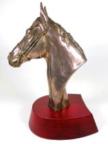 Beautifully Sculpted Horses Head in filled Hallmarked Silver . Bears the signature R. Donaldson.