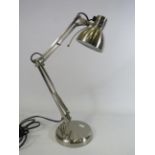 Modern chrome angle poise lamp.