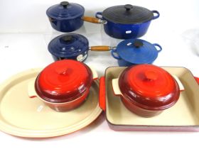 Six Le Creuset lidded pans (one has damage to handle, see photo) plus two longer serving dishes. See