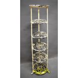 Five tier aluminium plant/pan stand raised on paw feet. Measures approx H:48 tall.  See photos. 