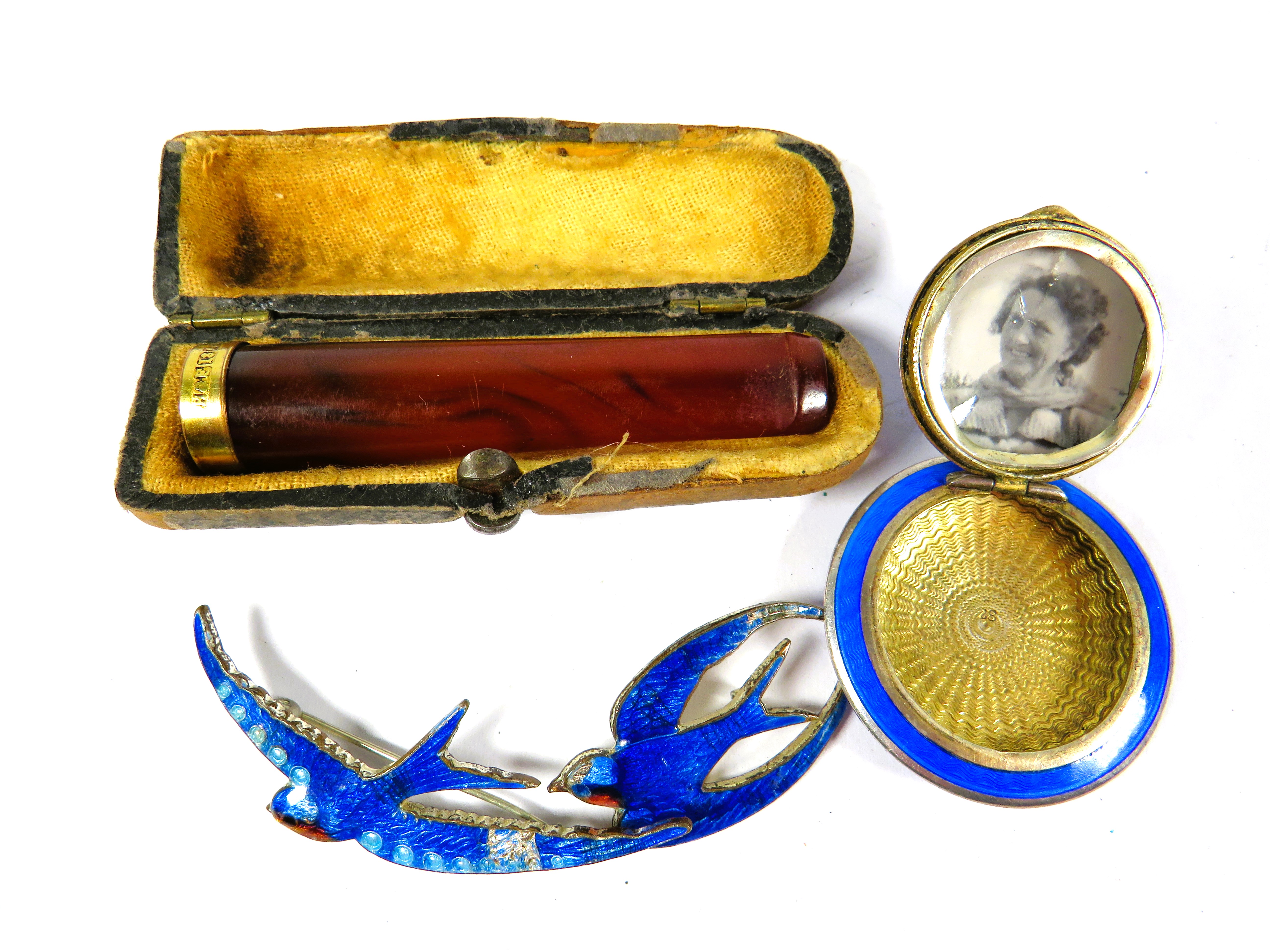Pretty Metal and enamel Guilloche mini compact plus two Bluebird badges together with lucite Cigaret