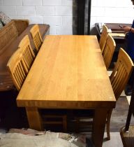 Heavy Oak Table of good quality and finish. Comes with six chairs with shaped backs,. See photos.