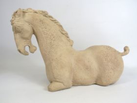 Large Tang stone horse sculpture, approx 30cm tall and 48cm long.