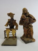 2 Folk art paper figurines the tallest stands 11".