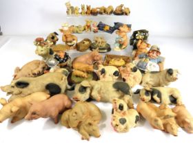 Large Selection of Resin and Ceramic Pig figures. See photos.