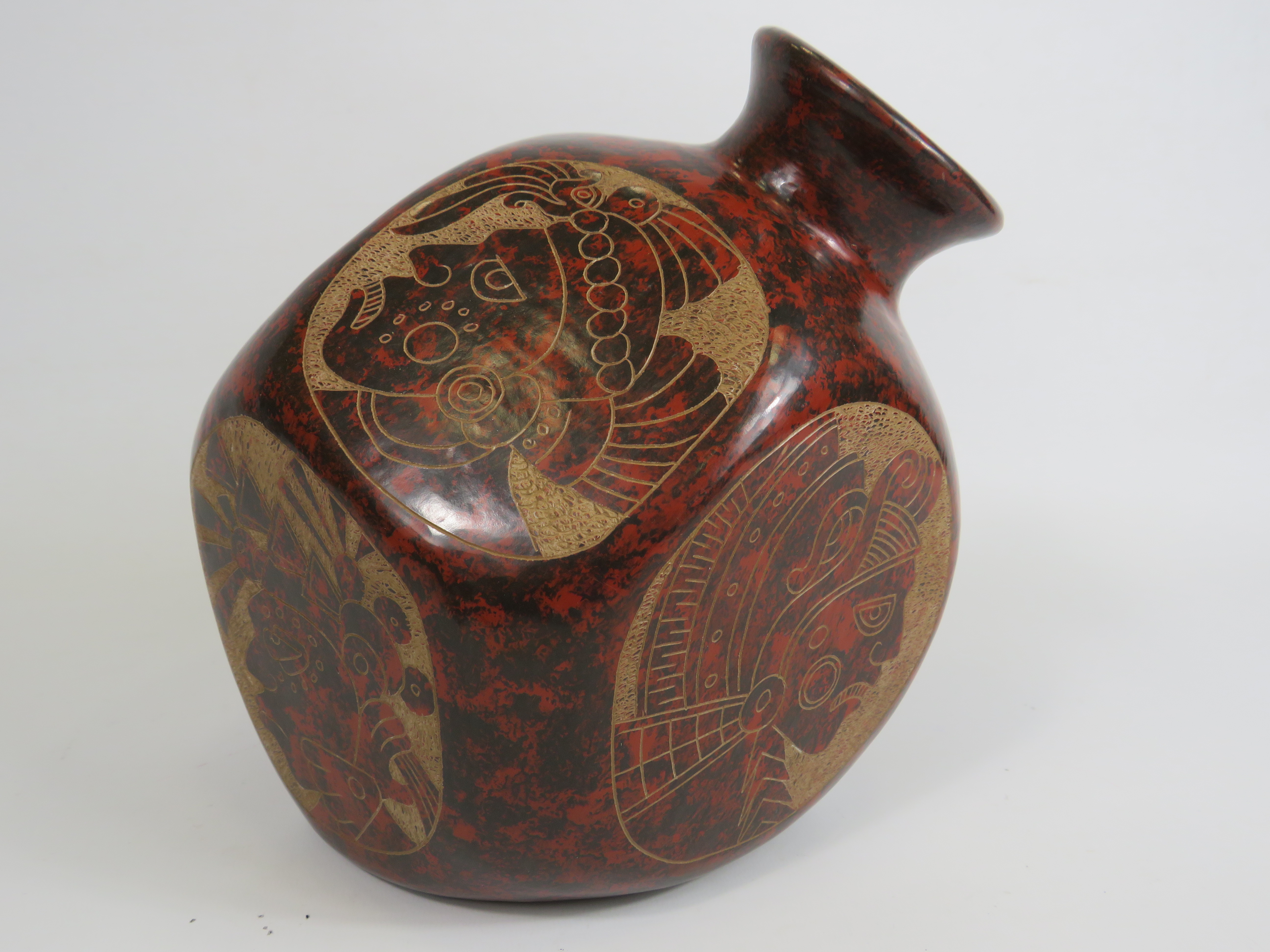 Nicaragua etched ceramic decorative multifaceted vase 24cm tall.