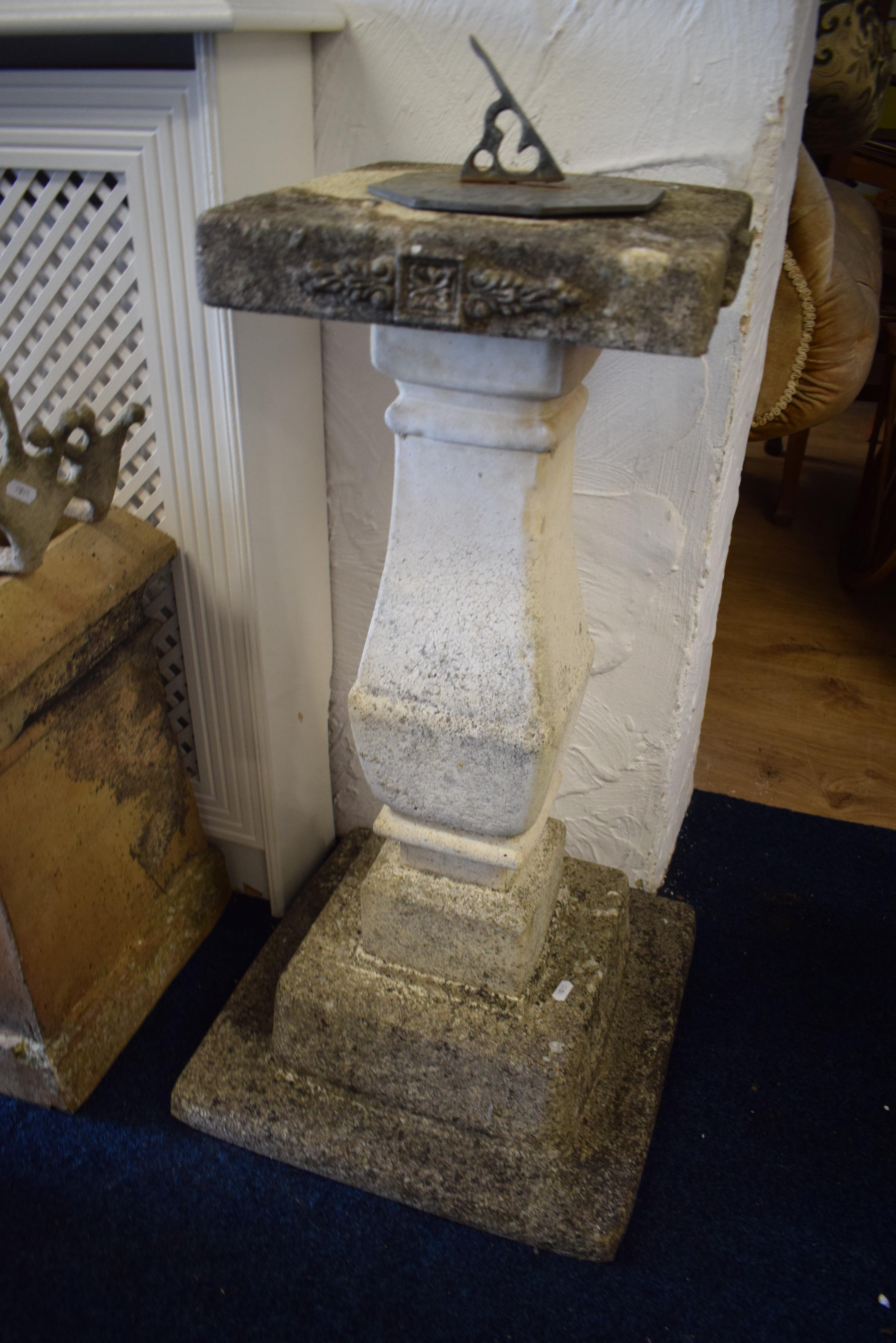 Reconstituted stone garden sundial.  H:32 inches tall. See photos. 