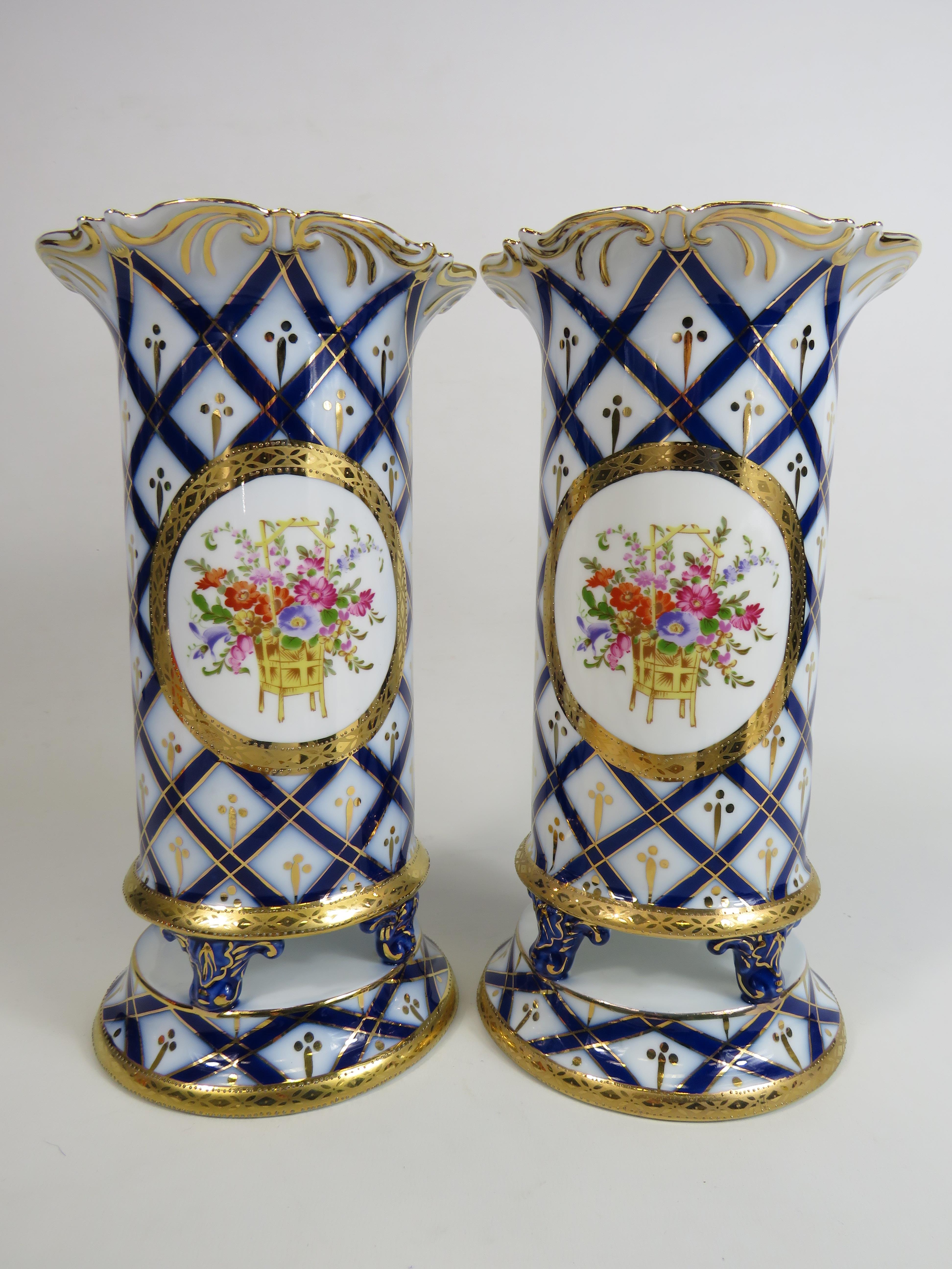 Pair of Roselle Occ & Co Staffordshire vases with hand decorated flowers, approx 29cm tall.