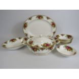 Selection of Royal Albert old country roses dinnerware including a tureen and oval serving plate.