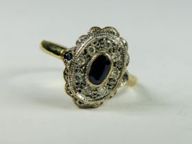 9ct Antique Style ring set with a central oval Sapphire with Diamond Surround. Finger size 'L-5'