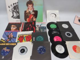 Small Selection of Vinyl LP's & 45's by Adam and the Ants, Two tone by Bad Manners, Madness. See pho