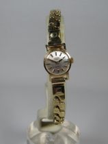 Ladies Rotary quartz watch with expanding strap. 9ct Body. May need new battery. See photos. 
