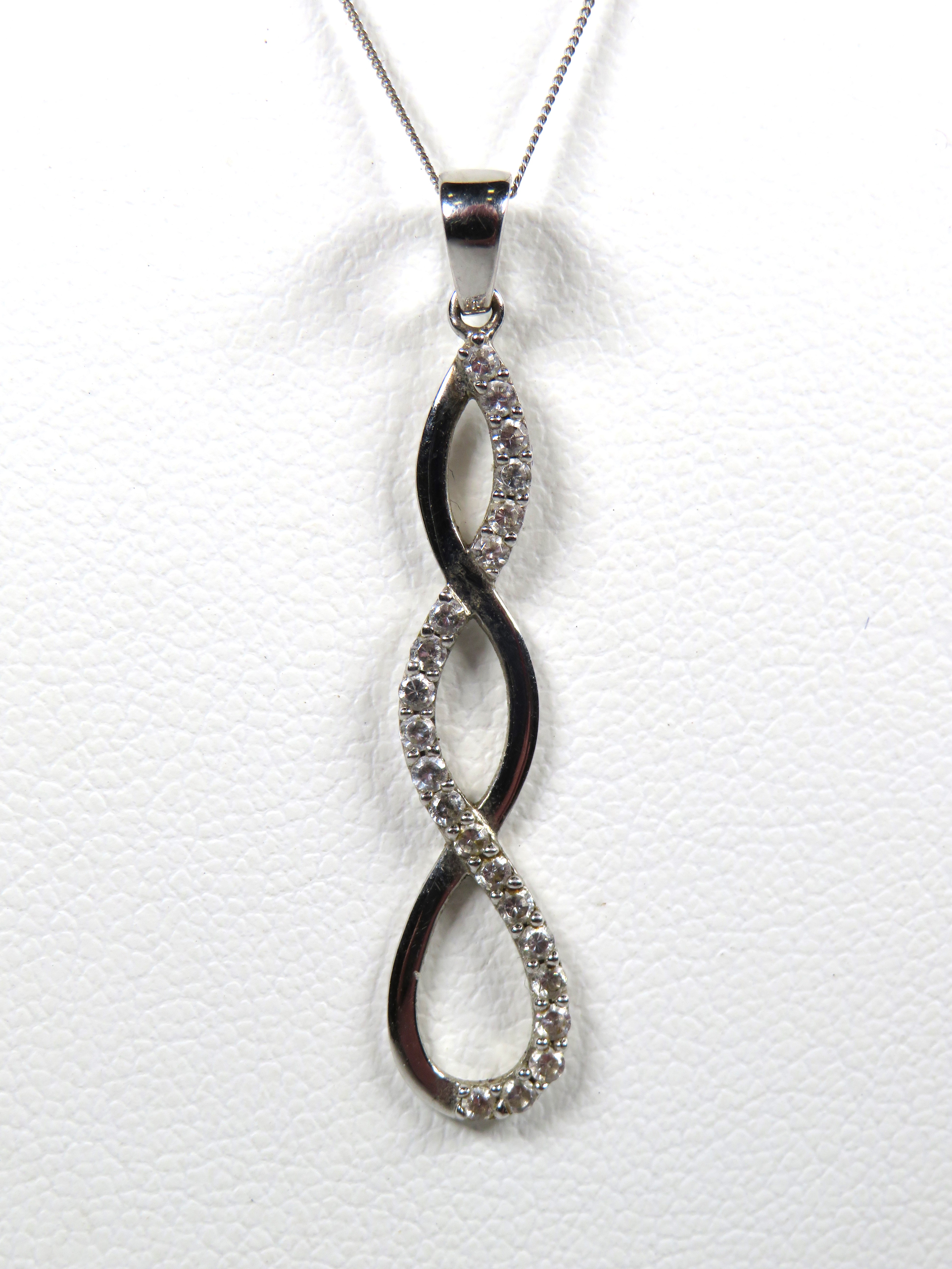 9ct White Gold CZ set Helix twist pendant set on an 18 inch White Gold chain.  Total weight 1.6g - Image 2 of 2