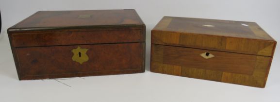 A vintage wooden writing box and a vintage wooden sewing box.