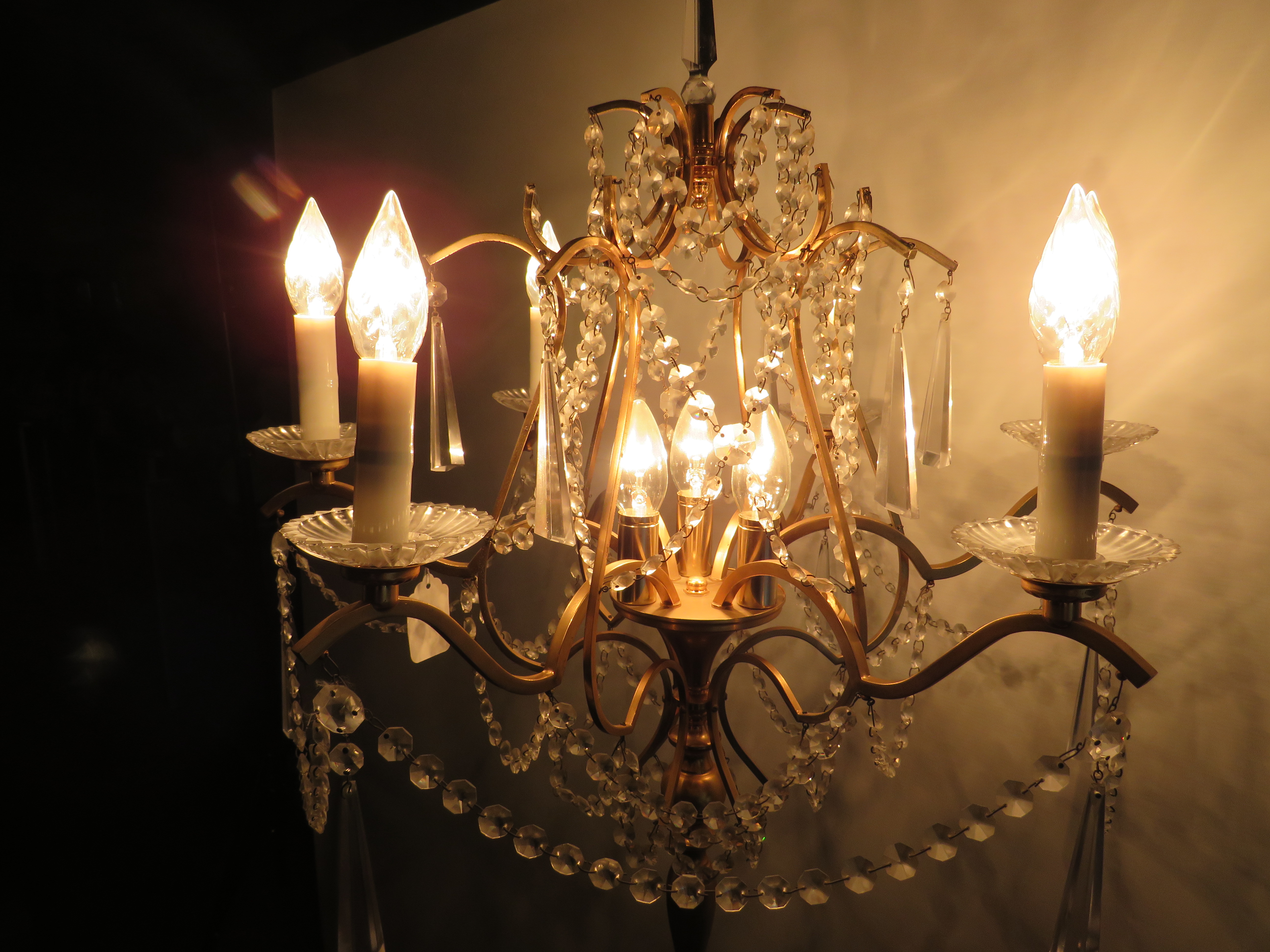 Brushed metal brass effect Standard lamp with 9 Candle bulbs and hanging glass lustres. Approx 67 in