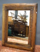 Large Wooden mirror with carved inset roundles. H:40X W:32 Inches. See photos. S2