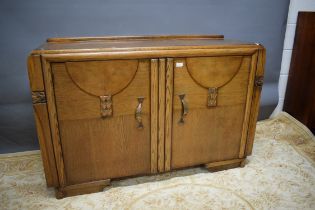 Art Deco style sideboard. Two internal hidden drawers behind cupboards. Brass handles. See phot
