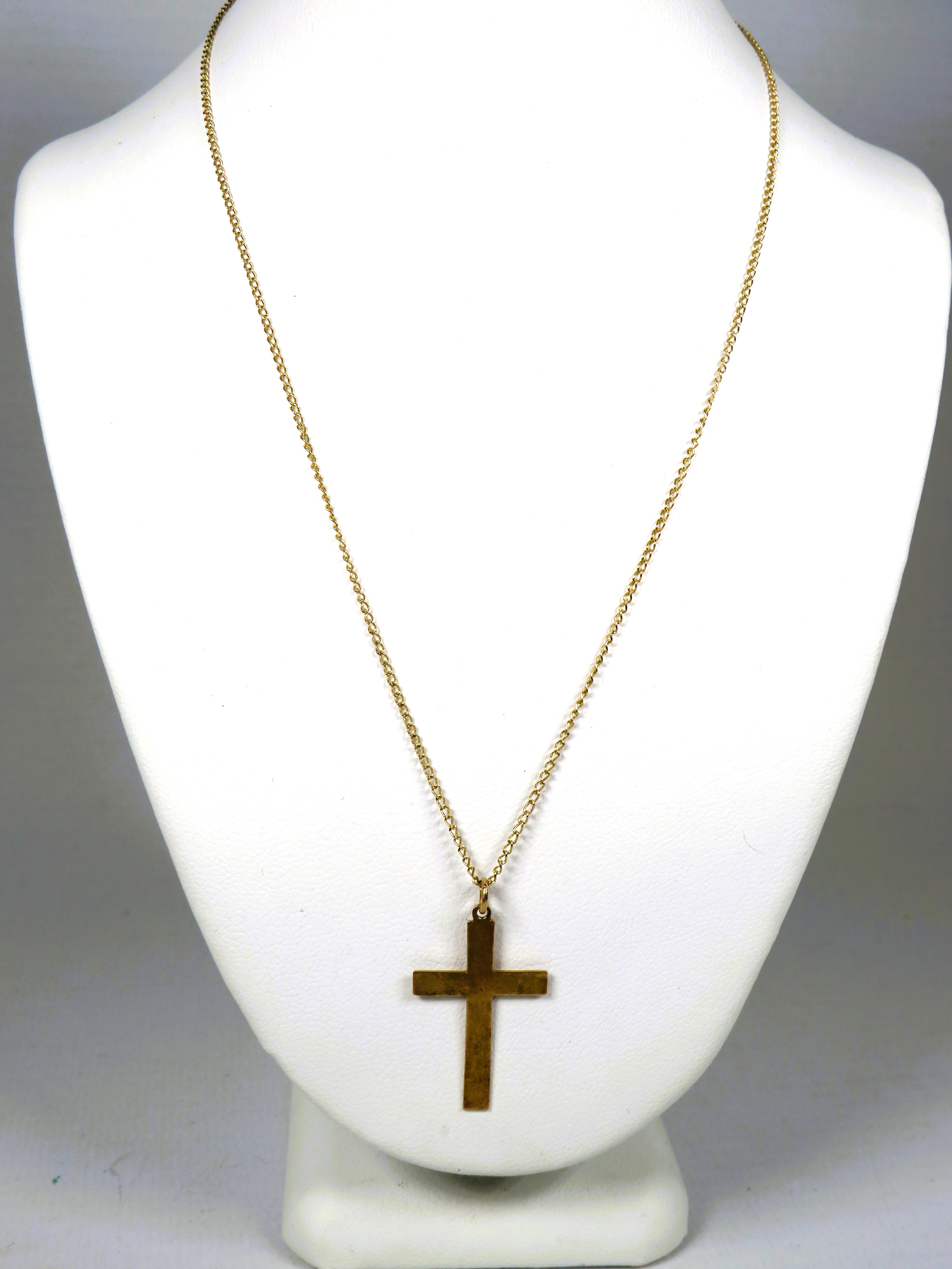 9ct Yellow Gold Crucifix hung on a 14 inch, 9ct Gold Chain.   Total weight 1.8g  see photos. 