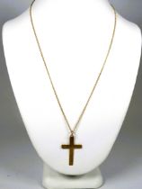 9ct Yellow Gold Crucifix hung on a 14 inch, 9ct Gold Chain. Total weight 1.8g see photos.