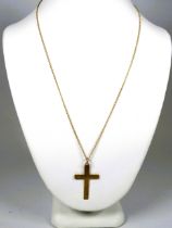 9ct Yellow Gold Crucifix hung on a 14 inch, 9ct Gold Chain.   Total weight 1.8g  see photos. 