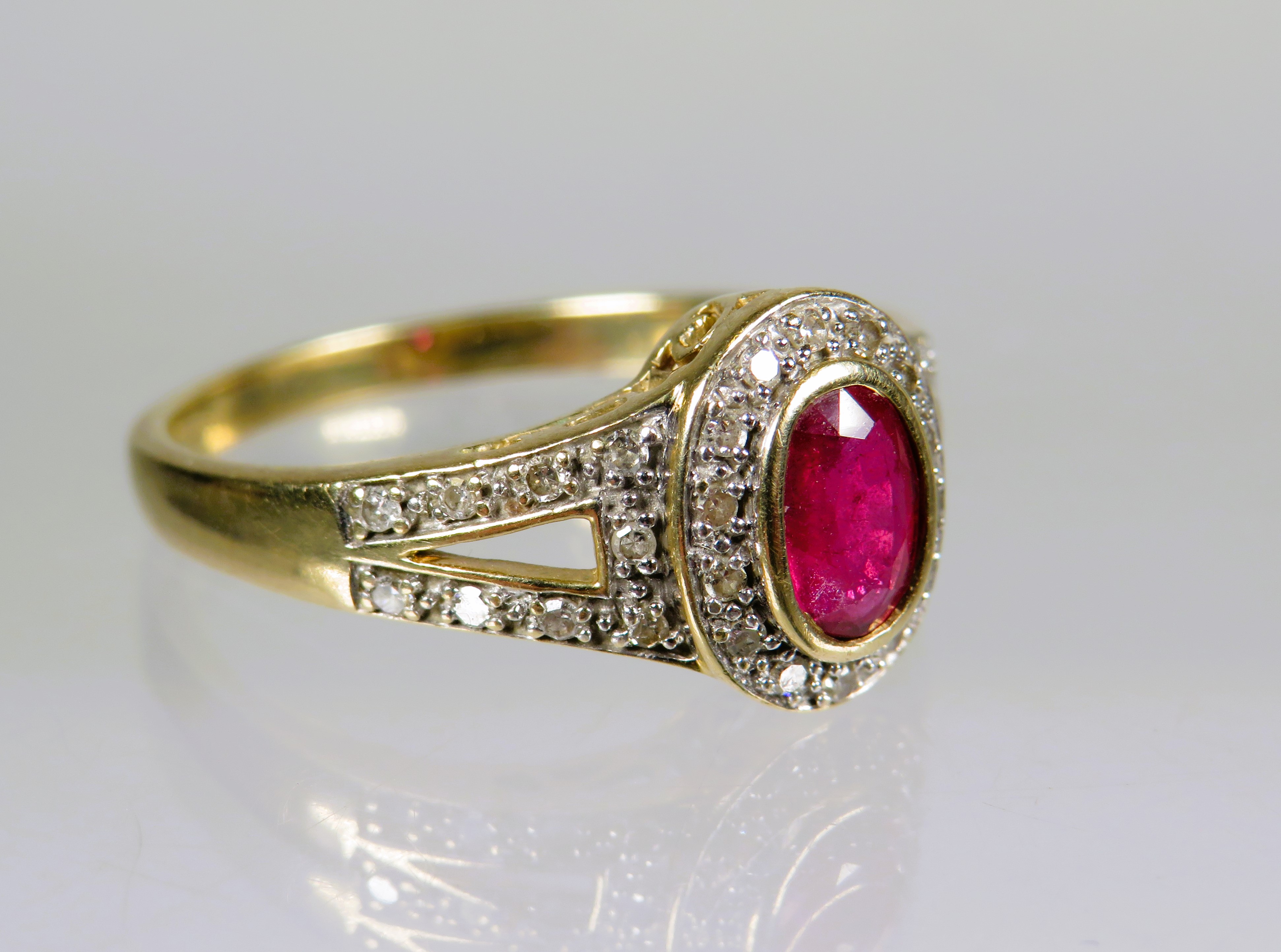 9ct Yellow Gold Ring set with a Central Oval Ruby with Diamonds to Shoulders.  Finger size 'P'    2. - Image 2 of 3