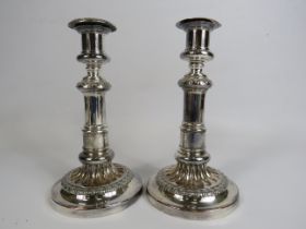 Near pair of silver plated extending candle sticks, 21cm lowest & extended 28cm.