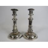Near pair of silver plated extending candle sticks, 21cm lowest & extended 28cm.