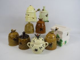 Selection of bee pattern honey preserve pots.