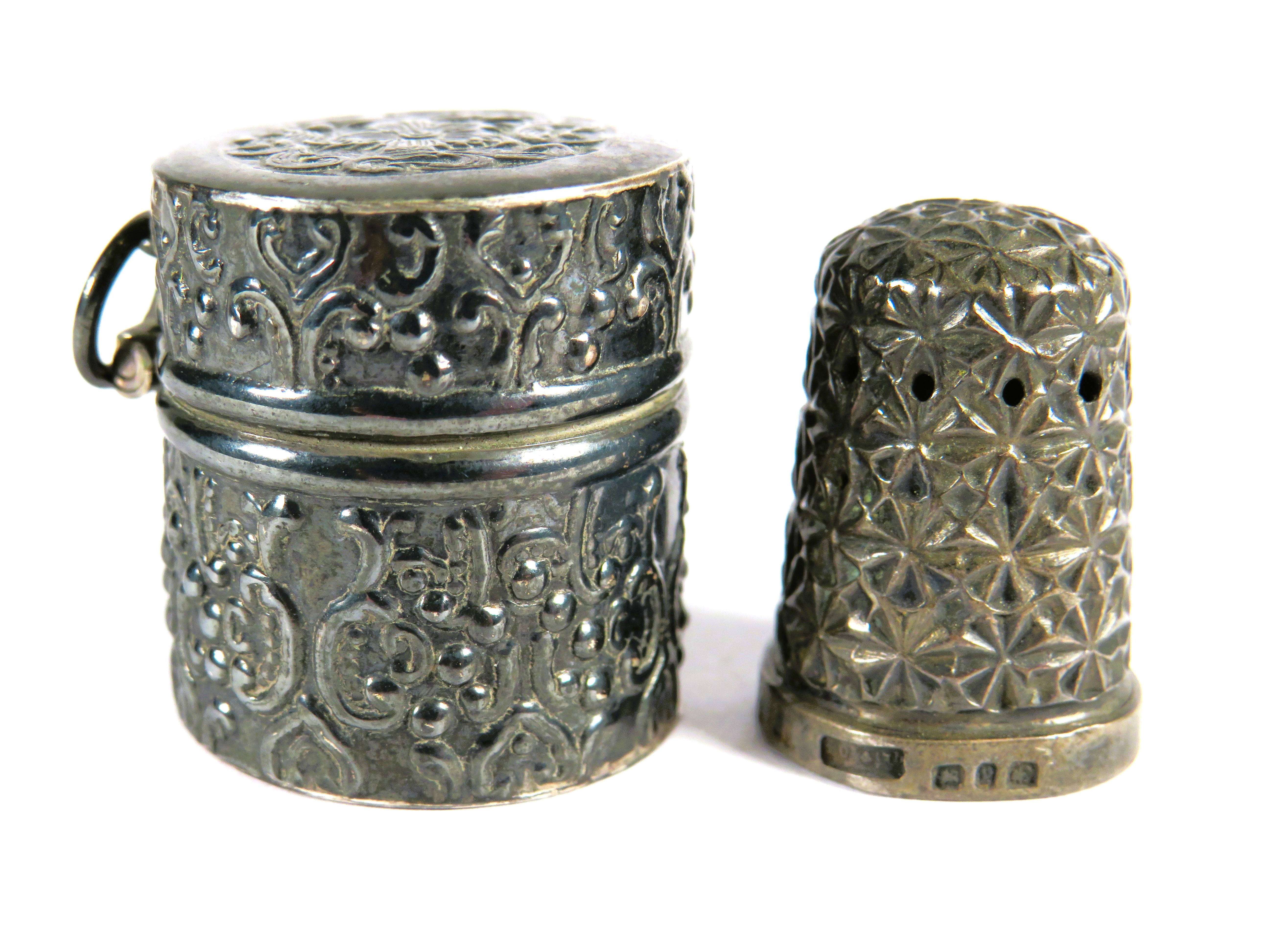 Hallmarked Silver Thimble with 925 Silver Thimble case with hinged lid and thimble mount within.  To