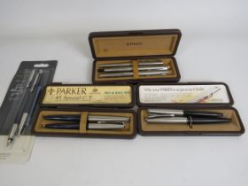 4 Parker fountain and ballpoint pen all with boxes.