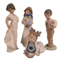 4 Lladro figurines of children the tallest stands 21.5cm.