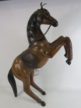 Large vintage leather rearing horse, 32.5" tall and 27" long