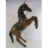 Large vintage leather rearing horse, 32.5" tall and 27" long