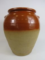 Large antique Stoneware Olive or Flour storage jar, approx 17 inches tall. Has had a repair to the