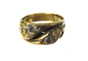 18ct Yellow Gold Double Snake Head Ring. Each snake has a Diamond to its Head and small Melee Diamon