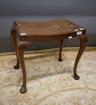 Handy sized Bergere topped footstool raised on tapered cabriole legs. H:18 x W:18 x D:13 Inches. See