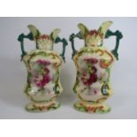 Near pair of vintage continetal transfer printed twin handle vases, one has had a repair to the